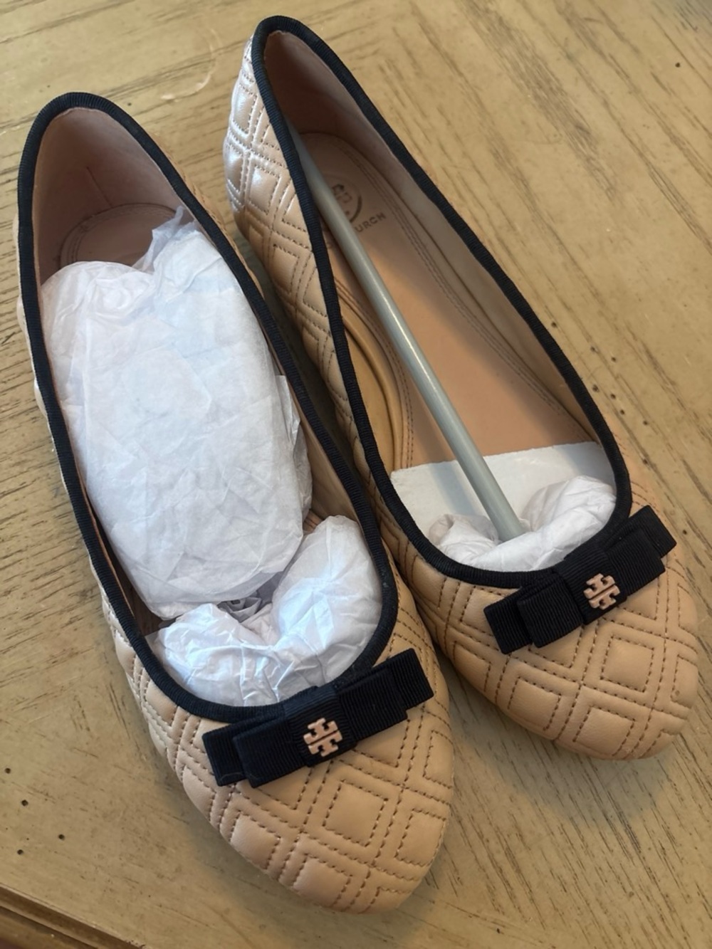 Tory Burch Quilted Ballet Flats in Nude with Black Trim & Bow
